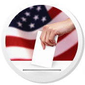 hand placing ballot in box with American flag in the background